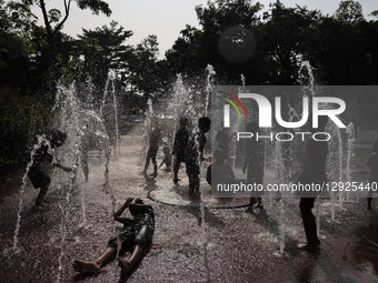 Children play at a public park fountain during hot weather in Jakarta, Indonesia, on October 19, 2025. Indonesia's Meteorology, Climatology,... by Agoes Rudianto/NurPhoto