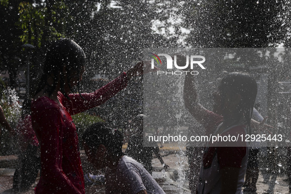 Children play at a public park fountain during hot weather in Jakarta, Indonesia, on October 19, 2025. Indonesia's Meteorology, Climatology,... by Agoes Rudianto/NurPhoto