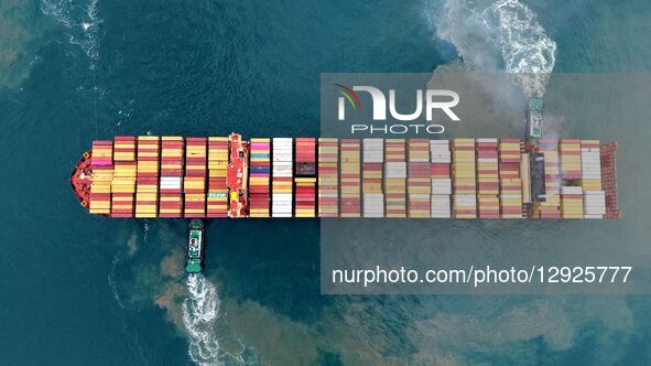 A cargo ship loaded with foreign trade containers departs from Qingdao Port in Qingdao City, Shandong Province, China, on October 30, 2025.  by Costfoto/NurPhoto