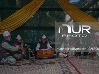 Kashmiri artists perform Kashmiri Sufi music during the 'Know Your Artisan' exhibition organized by the Department of Handicrafts and Handlo... by Firdous Nazir/NurPhoto