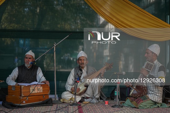 Kashmiri artists perform Kashmiri Sufi music during the 'Know Your Artisan' exhibition organized by the Department of Handicrafts and Handlo... by Firdous Nazir/NurPhoto