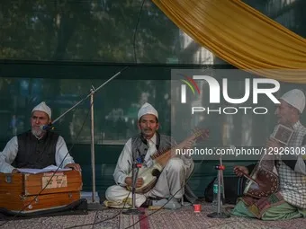 Kashmiri artists perform Kashmiri Sufi music during the 'Know Your Artisan' exhibition organized by the Department of Handicrafts and Handlo... by Firdous Nazir/NurPhoto