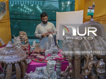 Walnut wood carving items are displayed during the 'Know Your Artisan' exhibition organized by the Department of Handicrafts and Handloom Ka... by Firdous Nazir/NurPhoto