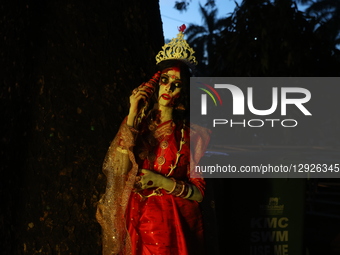 A woman dressed as a ghost with a costume poses for a picture during celebrations ahead of Halloween in Kolkata, India, on October 30, 2025.... by Rupak De Chowdhuri/NurPhoto
