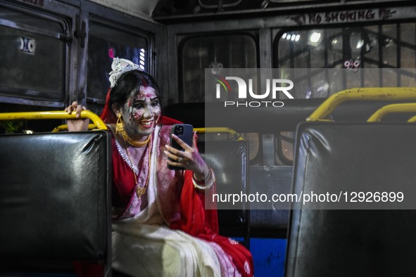 A lady dressed in a ghost costume poses for the camera as she participates in a dressing competition ahead of the Halloween celebration in K... by Debarchan Chatterjee/NurPhoto