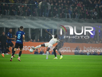 Moise Kean of AFC Fiorentina and Yann Aurel Bisseck of Inter Milan battle for the ball during a Serie A match between Inter Milan and AFC Fi... by Andrea Diodato/NurPhoto