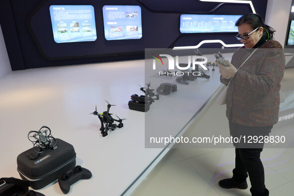 A foreign guest visits a drone at the Low Altitude Flight Service Center in Binzhou High Tech Industrial Development Zone in Binzhou City, S... by Costfoto/NurPhoto