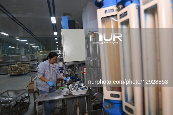 A worker works at a smart water meter manufacturing enterprise in Qingzhou Economic Development Zone, Qingzhou City, Shandong Province, Chin... by Costfoto/NurPhoto