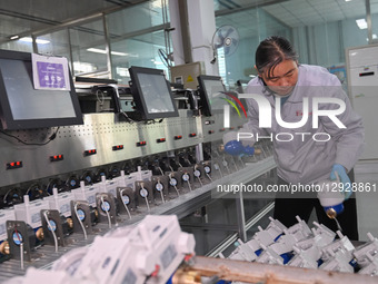 A worker works at a smart water meter manufacturing enterprise in Qingzhou Economic Development Zone, Qingzhou City, Shandong Province, Chin... by Costfoto/NurPhoto
