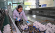 A worker works at a smart water meter manufacturing enterprise in Qingzhou Economic Develo...