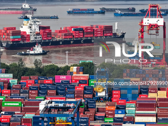 The containers park in Longtan Port Area of Nanjing Port in Nanjing City, Jiangsu Province, China, on October 31, 2025.  by Costfoto/NurPhoto