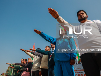 Kashmiri students hold Indian National Flags as thousands take part in the event, which sees participation from students, youth, and officia... by Nasir Kachroo/NurPhoto