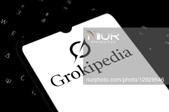 The Grokipedia logo appears on a smartphone screen in this photo illustration in Athens, Greece, on October 31, 2025.  by Nikolas Kokovlis/NurPhoto