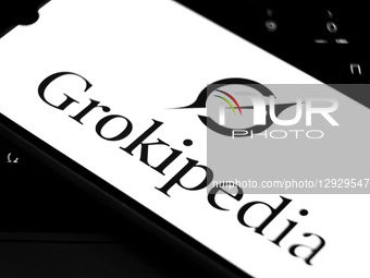 The Grokipedia logo appears on a smartphone screen in this photo illustration in Athens, Greece, on October 31, 2025.  by Nikolas Kokovlis/NurPhoto