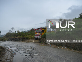 Garbage trucks carrying waste from Kathmandu remain halted on the way after obstructions at the Bancharhedanda landfill site in Nuwakot, Nep... by Safal Prakash Shrestha/NurPhoto