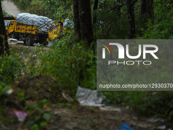 Garbage trucks carrying waste from Kathmandu remain halted on the way after obstructions at the Bancharhedanda landfill site in Nuwakot, Nep... by Safal Prakash Shrestha/NurPhoto