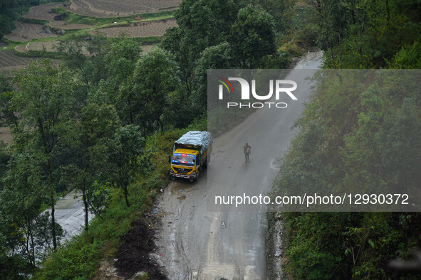 Garbage trucks carrying waste from Kathmandu remain halted on the way after obstructions at the Bancharhedanda landfill site in Nuwakot, Nep... by Safal Prakash Shrestha/NurPhoto