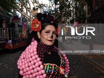 Cosplayer Claudia from Colombia poses for a photo during New York's 52nd Annual Village Halloween Parade in New York, N.Y., on October 31, 2... by Gordon Donovan/NurPhoto