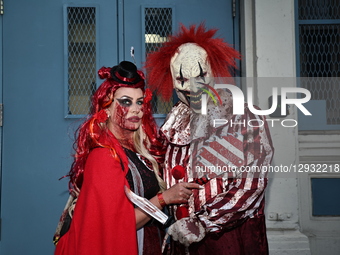 Cosplayers dressed as horror show characters pose for a photo during the 52nd Annual Village Halloween Parade in New York, N.Y., on October... by Gordon Donovan/NurPhoto