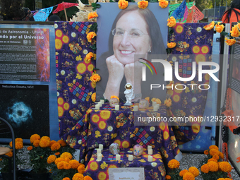 An offering featuring a photograph of Mexican astronomer Julieta Fierro is seen during the National Autonomous University of Mexico's (UNAM)... by Jose Luis Torales/NurPhoto