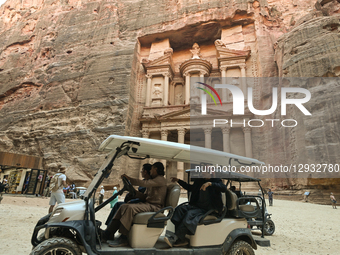 PETRA, JORDAN – OCTOBER 26:
An electric vehicle used to transport tourists for an additional fee is seen in front of Al-Khazneh (the Treasur... by STR/NurPhoto