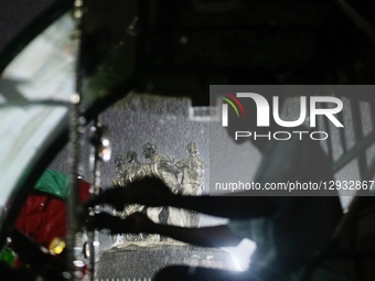 A rickshaw puller rides through the rain in Dhaka, Bangladesh, on November 1, 2025.  by Syed Mahamudur Rahman/NurPhoto