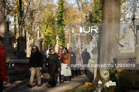 In Krakow, Poland, on November 1, 2025, people visit Rakowicki Cemetery during All Saints' Day. November 1 is celebrated in Catholicism as A... by Klaudia Radecka/NurPhoto