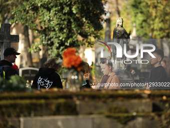In Krakow, Poland, on November 1, 2025, people visit Rakowicki Cemetery during All Saints' Day. November 1 is celebrated in Catholicism as A... by Klaudia Radecka/NurPhoto