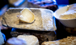A board of cheeses from diverse origins showcases textures, aromas, and flavors that tell...
