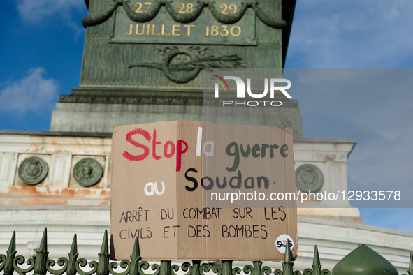 A placard calls for an end to the war in Sudan at a demonstration, in Paris, France, on November 1, 2025.,   by Vincent Koebel/NurPhoto