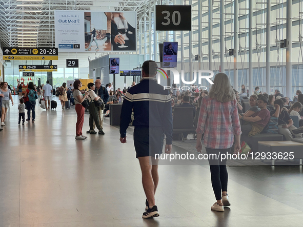 Travelers are at Quebec City Jean Lesage International Airport in Quebec City, Quebec, Canada, on July 22, 2025.  by Creative Touch Imaging Ltd/NurPhoto