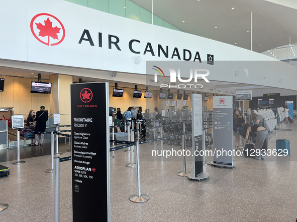 The Air Canada check-in counter is at Quebec City Jean Lesage International Airport in Quebec City, Quebec, Canada, on July 22, 2025.  by Creative Touch Imaging Ltd/NurPhoto