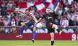 In Madrid, Spain, on November 1, Peque Fernandez of Sevilla and Koke Resurreccion of Atlet...