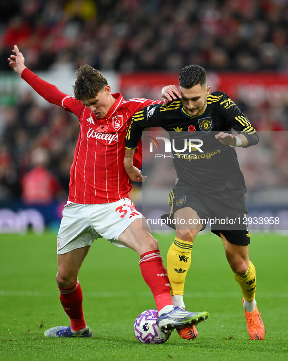 Nicolo Savona of Nottingham Forest competes with Diogo Dalot of Manchester United during the Premier League match between Nottingham Forest... by MI News/NurPhoto