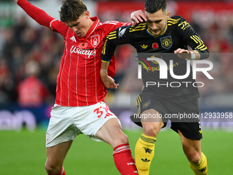 Nicolo Savona of Nottingham Forest competes with Diogo Dalot of Manchester United during the Premier League match between Nottingham Forest... by MI News/NurPhoto