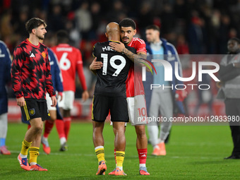Morgan Gibbs-White of Nottingham Forest embraces Bryan Mbeumo of Manchester United after the final whistle during the Premier League match b... by MI News/NurPhoto