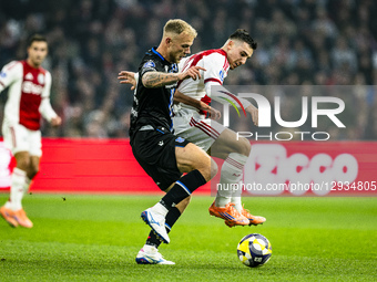 SC Heerenveen midfielder Luuk Brouwers and AFC Ajax Amsterdam midfielder Oscar Gloukh play during the match between AFC Ajax Amsterdam and S... by EYE4images/NurPhoto