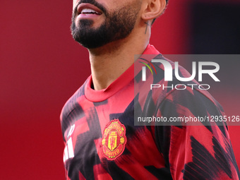 Matheus Cunha of Manchester United warms up ahead of kick-off during the Premier League match between Nottingham Forest and Manchester Unite... by MI News/NurPhoto
