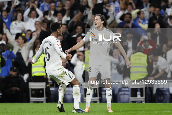In Madrid, Spain, on November 1, Alvaro Carreras of Real Madrid and Jude Bellingham of Real Madrid celebrate a goal during the La Liga 2025/... by Guillermo Martinez/NurPhoto