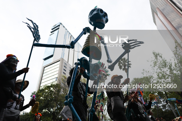 Participants take part in the Day of the Dead parade in Mexico City, Mexico on November 1, 2025.  by Jakub Porzycki/NurPhoto