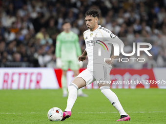 Raul Asencio of Real Madrid is in action during the La Liga 2025/26 match between Real Madrid and Valencia at Santiago Bernabeu Stadium in M... by Guillermo Martinez/NurPhoto