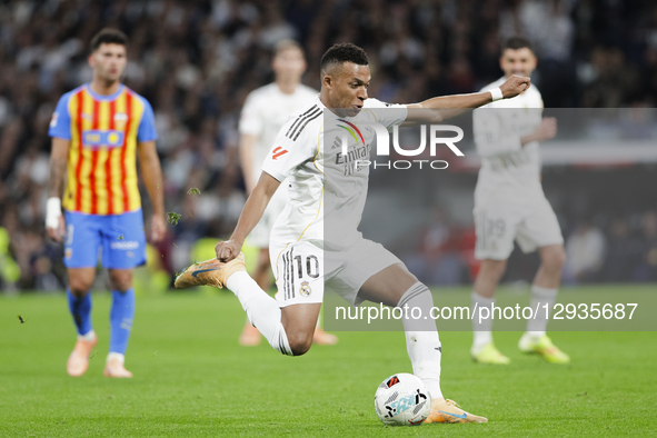 Kylian Mbappe of Real Madrid is in action during the La Liga 2025/26 match between Real Madrid and Valencia at Santiago Bernabeu Stadium in... by Guillermo Martinez/NurPhoto