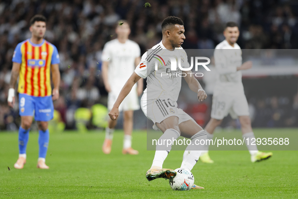 Kylian Mbappe of Real Madrid is in action during the La Liga 2025/26 match between Real Madrid and Valencia at Santiago Bernabeu Stadium in... by Guillermo Martinez/NurPhoto