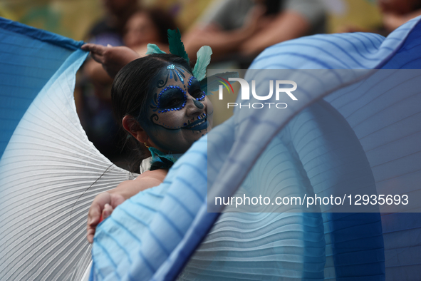 A participant takes part in the Day of the Dead parade in Mexico City, Mexico on November 1, 2025.  by Jakub Porzycki/NurPhoto