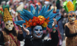 Participants take part in the Day of the Dead parade in Mexico City, Mexico on November 1,...