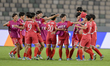 Korea DPR players celebrate their qualification to the semifinals during the FIFA U17 Wome...