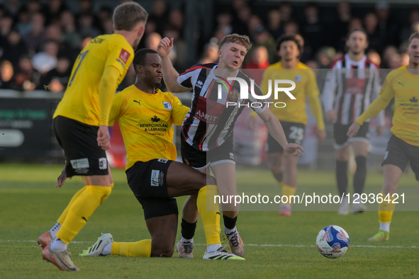Rekeem Harper of Barrow AFC and Tom Jones of Spennymoor Town clash in midfield during the Emirates FA Cup First Round match between Spennymo... by MI News/NurPhoto