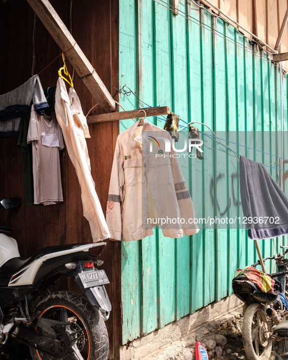 A squalid factory worker's residence stands adjacent to the nickel industrial area owned by Indonesia Weda Bay Industrial Park (IWIP) in Wed... by Muhammad Fauzy/NurPhoto