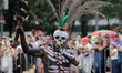 A person participates in the 2025 Dia de Muertos Parade at Paseo de la Reforma Avenue duri...