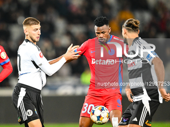 Jovo Lukic and Siyabonga Ngezana are in action during the Romanian Superliga match between Universitatea Cluj and FCSB at Cluj Arena in Cluj... by Flaviu Buboi/NurPhoto